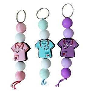Nurse badge pulls keychains scrubs pink blue purple